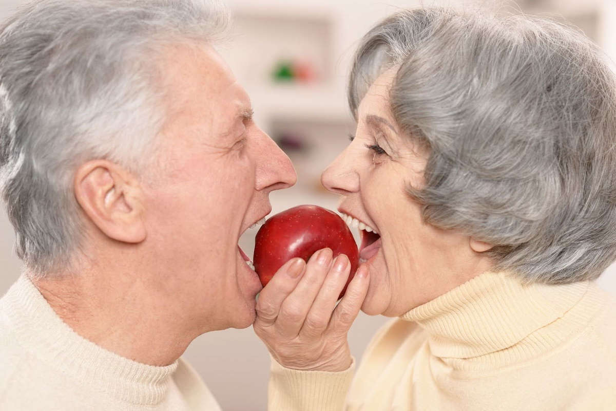 senior-dental-implants-vs-dentures-camas